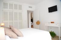 Posteľ alebo postele v izbe v ubytovaní Apartamentos CostaMar 1; Apartamento nº11