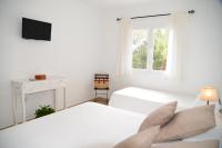 Posteľ alebo postele v izbe v ubytovaní Apartamentos CostaMar 1; Apartamento nº11
