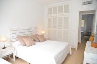 Posteľ alebo postele v izbe v ubytovaní Apartamentos CostaMar 1; Apartamento nº11