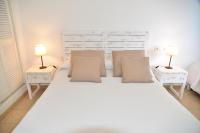 Posteľ alebo postele v izbe v ubytovaní Apartamentos CostaMar 1; Apartamento nº11