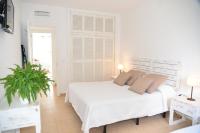 Posteľ alebo postele v izbe v ubytovaní Apartamentos CostaMar 1; Apartamento nº11