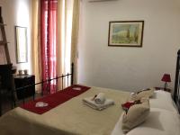 Postel nebo postele na pokoji v ubytování B&B Antonella