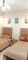 Postel nebo postele na pokoji v ubytování grand agata hostel