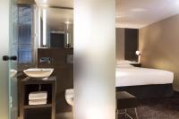 a bedroom with a bed and a sink and a toilet at Best Western Quartier Latin Pantheon in Paris