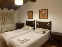 Postel nebo postele na pokoji v ubytování Casa Clemente II