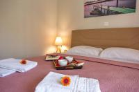 Posteľ alebo postele v izbe v ubytovaní Sun & Sea Luxury Apartment