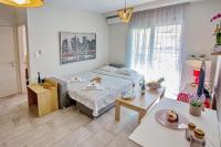 Posteľ alebo postele v izbe v ubytovaní Sun & Sea Luxury Apartment