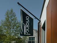 a black banner hanging from the side of a building at Original Boutique Hotel in Tbilisi City