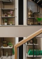 a staircase with shelves with potted plants on them at Original Boutique Hotel in Tbilisi City