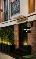 a sign on the front of an office building at Original Boutique Hotel in Tbilisi City