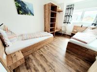 A bed or beds in a room at Haus Leitner