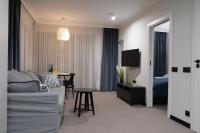 Televízia a/alebo spoločenská miestnosť v ubytovaní Blue Horizon Apartments