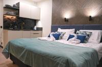 Posteľ alebo postele v izbe v ubytovaní Blue Horizon Apartments