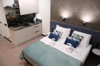 Posteľ alebo postele v izbe v ubytovaní Blue Horizon Apartments