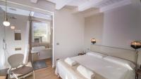 Łóżko lub łóżka w pokoju w obiekcie Villa Aura 6, Emma Villas