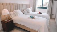 Posteľ alebo postele v izbe v ubytovaní Villa privada de lujo con piscina Villa Wabi Sabi