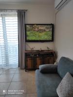 TV a/nebo společenská místnost v ubytování Galboka Nine