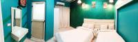 Postel nebo postele na pokoji v ubytování grand agata hostel