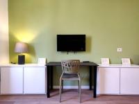 Televízia a/alebo spoločenská miestnosť v ubytovaní Area Milano Apartments - Tadino 17 close to Central Station