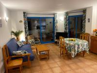 A seating area at Perla Blanca 3