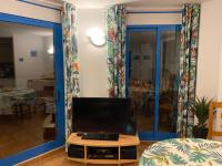 A television and/or entertainment centre at Perla Blanca 3