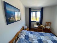 A bed or beds in a room at Perla Blanca 3