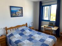 A bed or beds in a room at Perla Blanca 3