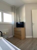 Telewizja i/lub zestaw kina domowego w obiekcie Aida Apartman Siófok