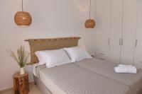 Postel nebo postele na pokoji v ubytování Milos Del Sol Apartment