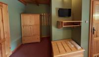 Posteľ alebo postele v izbe v ubytovaní Hotel Stara Stajnia
