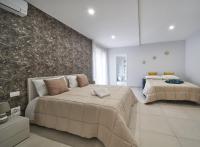 Posteľ alebo postele v izbe v ubytovaní B&B Iside