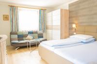 Posteľ alebo postele v izbe v ubytovaní Hotel Burgstallerhof