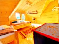 Posteľ alebo postele v izbe v ubytovaní Domek Góralski Stary Młyn Zakopane House