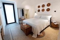 A bed or beds in a room at Corte Manfredi