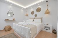 Posteľ alebo postele v izbe v ubytovaní Felicite apartments Naxos