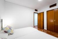 Postel nebo postele na pokoji v ubytování Holi-Rent Estrella