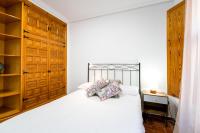 Postel nebo postele na pokoji v ubytování Holi-Rent Estrella