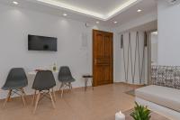 Televízia a/alebo spoločenská miestnosť v ubytovaní Felicite apartments Naxos