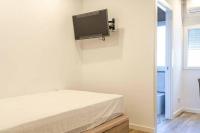 A bed or beds in a room at Valencia Playa