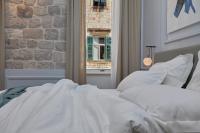 Postel nebo postele na pokoji v ubytování Bota Palace