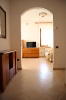 Posedenie v ubytovaní Appartamento L'arancio