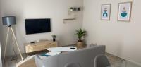 A television and/or entertainment centre at Apartamento Cadiz Centro Fabio Rufino
