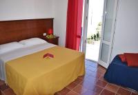 Postel nebo postele na pokoji v ubytování Favignana Casa Vacanza Orsola