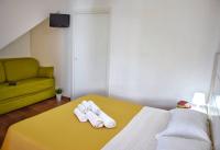 Postel nebo postele na pokoji v ubytování Favignana Casa Vacanza Orsola