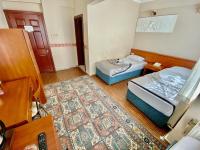 Postel nebo postele na pokoji v ubytování Kadikoy Kervansaray Hotel