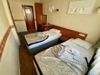 Postel nebo postele na pokoji v ubytování Kadikoy Kervansaray Hotel