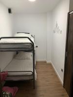 Posteľ alebo postele v izbe v ubytovaní Apartamento Doña Pia
