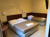 Hotel Nuevo Caminoにあるベッド