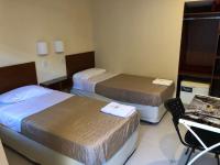 Hotel Nuevo Caminoにあるベッド