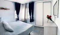 Łóżko lub łóżka w pokoju w obiekcie Apartamento VISTAenRELAX